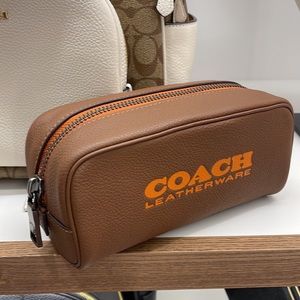 Coach Travel Kit 21
Dark Saddle/Canyon
